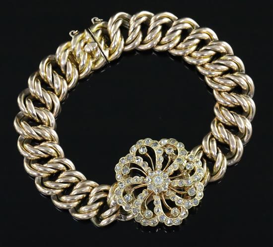 An 18ct gold and diamond set bracelet, gross weight 44 grams.